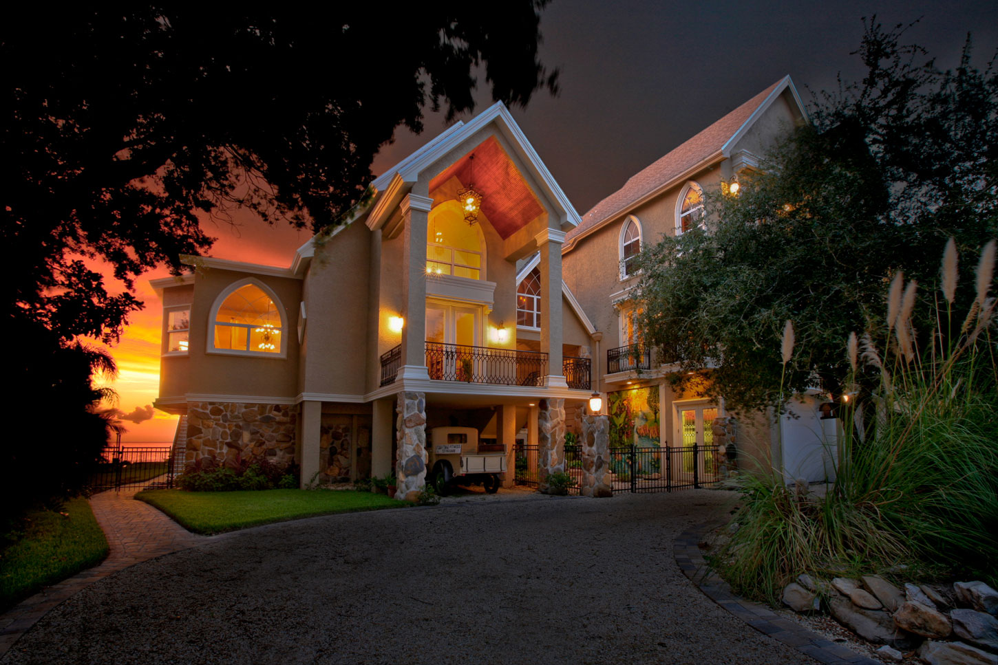 Sarasota custom home front elevation at sunset